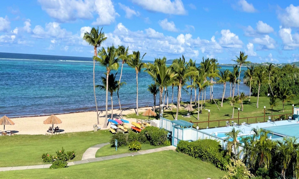 Estate Golden Rock Condo | SUMMER SPECIAL! Shore Beats Work—A Slice of Beachfront Paradise