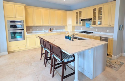 Cotton Valley House | Pristine 6 bed 6 bath villa in the islands premier gated community!