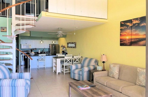 Estate Golden Rock Condo | SUMMER SPECIAL! Shore Beats Work—A Slice of Beachfront Paradise