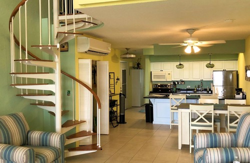 Estate Golden Rock Condo | SUMMER SPECIAL! Shore Beats Work—A Slice of Beachfront Paradise