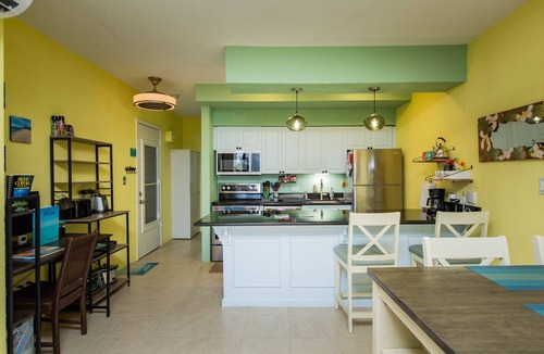 Estate Golden Rock Condo | SUMMER SPECIAL! Shore Beats Work—A Slice of Beachfront Paradise