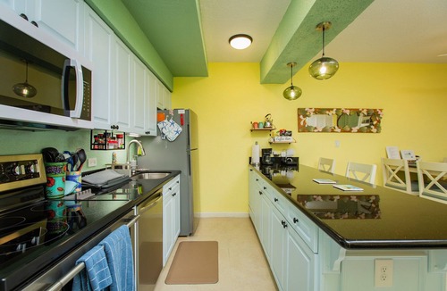 Estate Golden Rock Condo | SUMMER SPECIAL! Shore Beats Work—A Slice of Beachfront Paradise