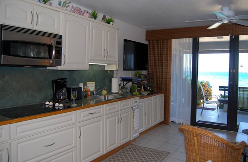 Red Hook Condo | "THREE PALMS"~ON beach, remodeled, private patio, generator, pool, quiet & clean